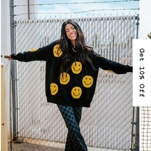 Black Sweater with Yellow Smiley Faces